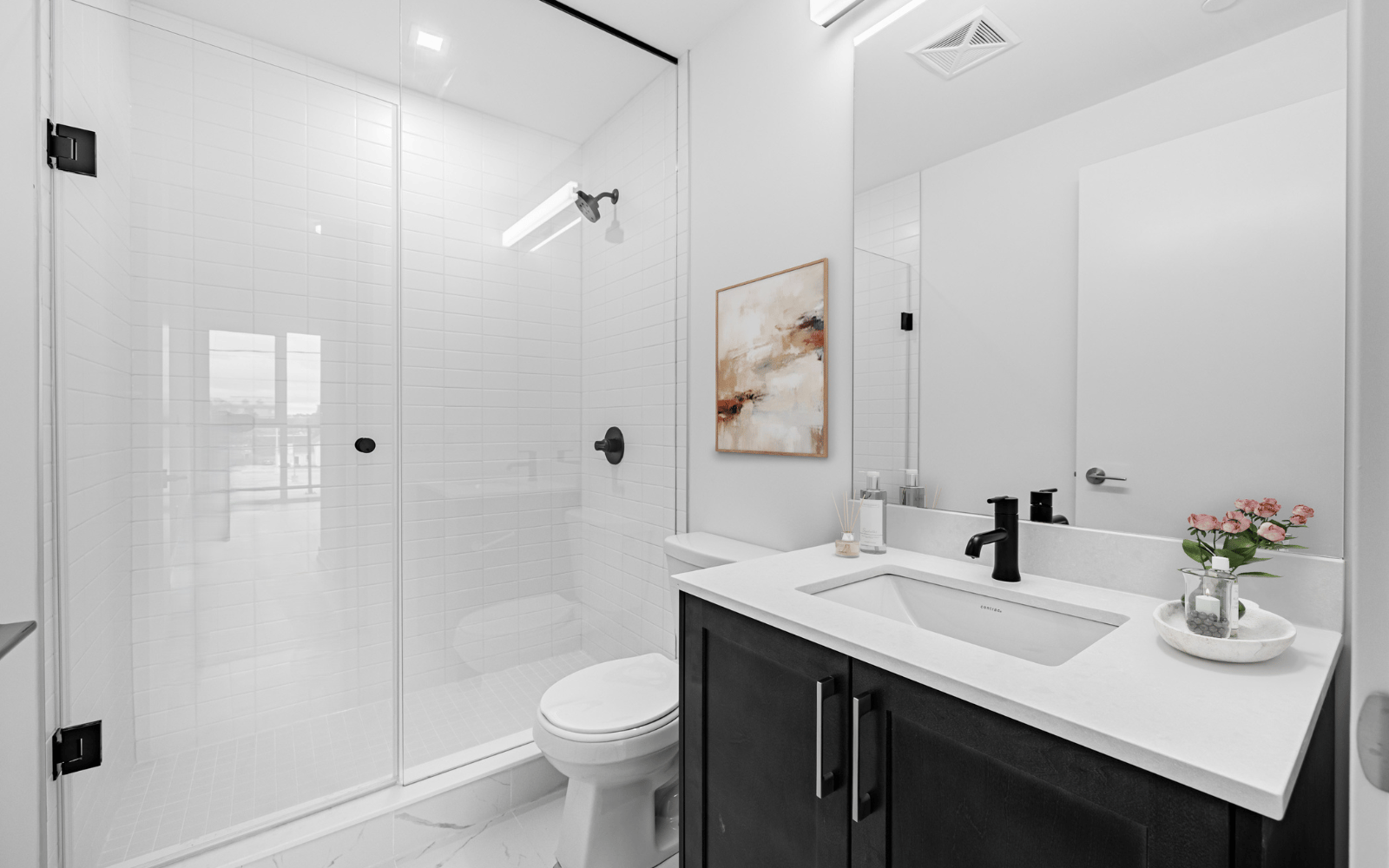 Virtually staged photo of the ensuite in Suite 101 at Station No. 3 in Whitby, ON