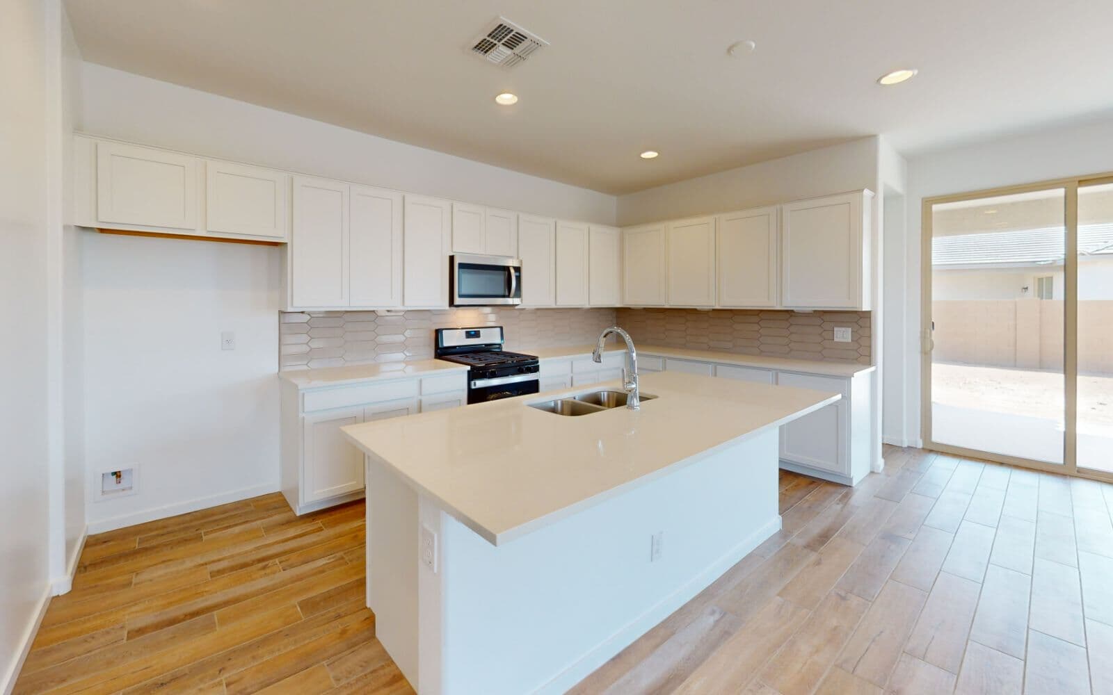 Kitchen in Clover Floor Plan at Highland Sage