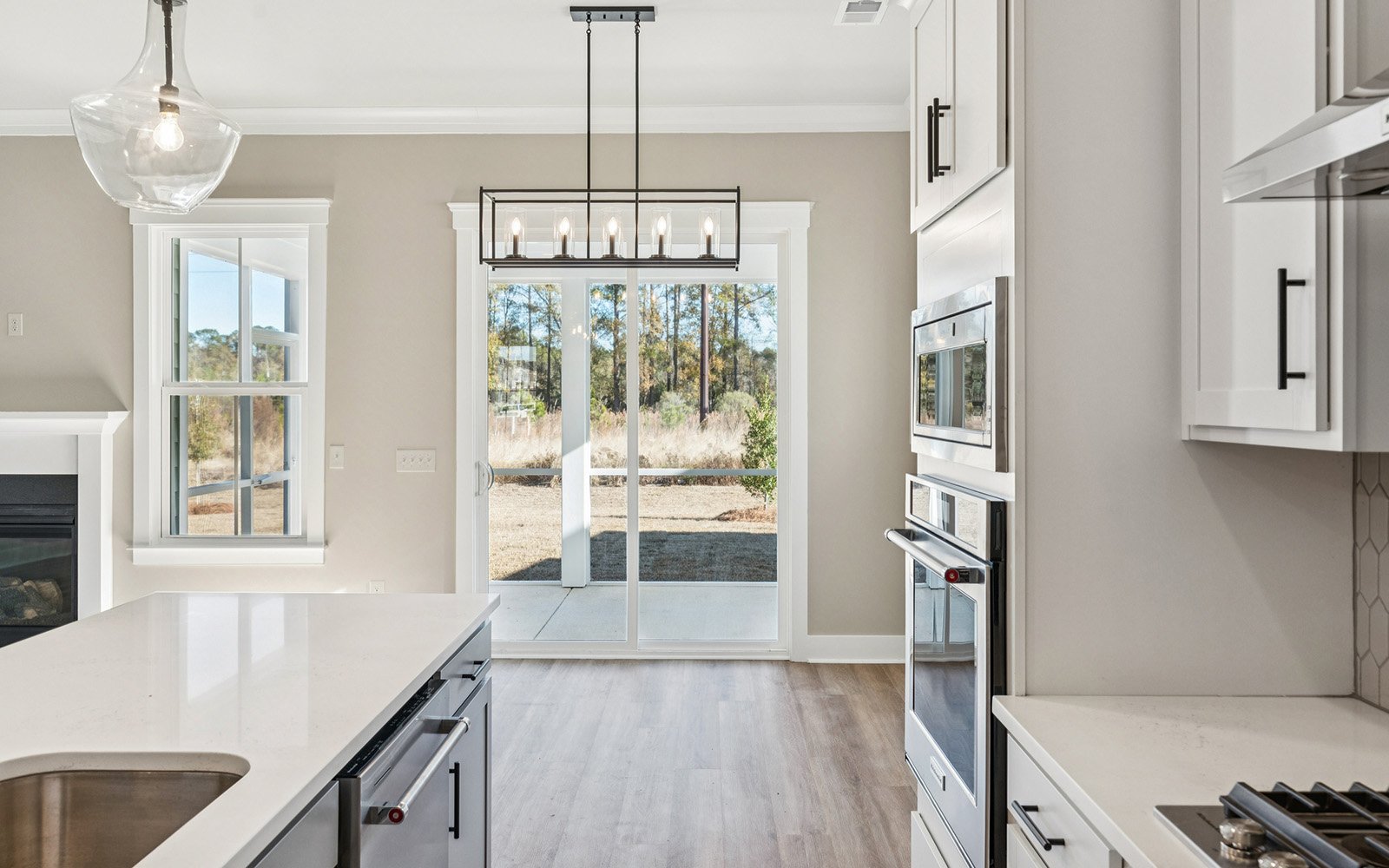 The kitchen and dining room of the Preston on homesite 1583 at Nexton.