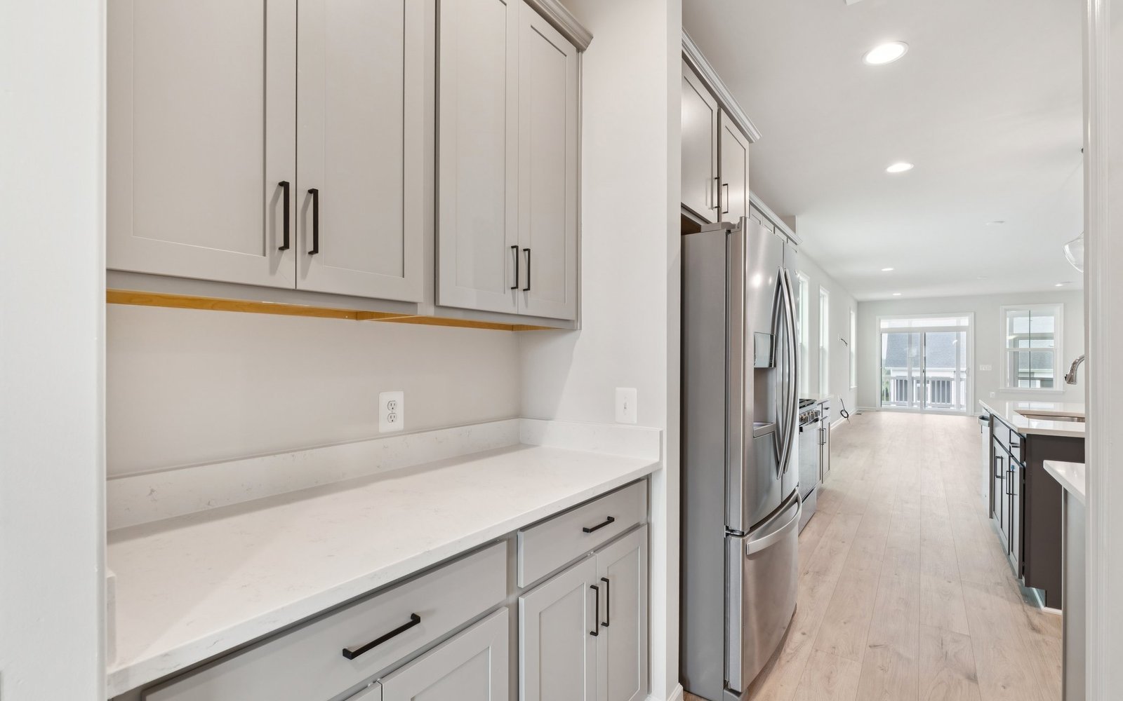 The butler's pantry of a Rockwell single family home at Hiatt Pointe at Snowden Bridge.