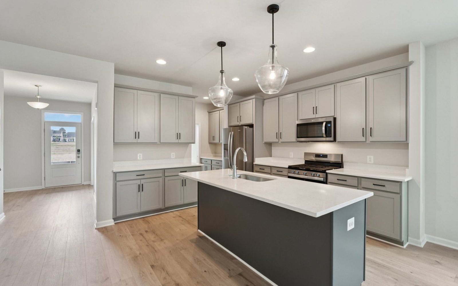 The kitchen of a Rockwell single family home at Hiatt Pointe at Snowden Bridge.