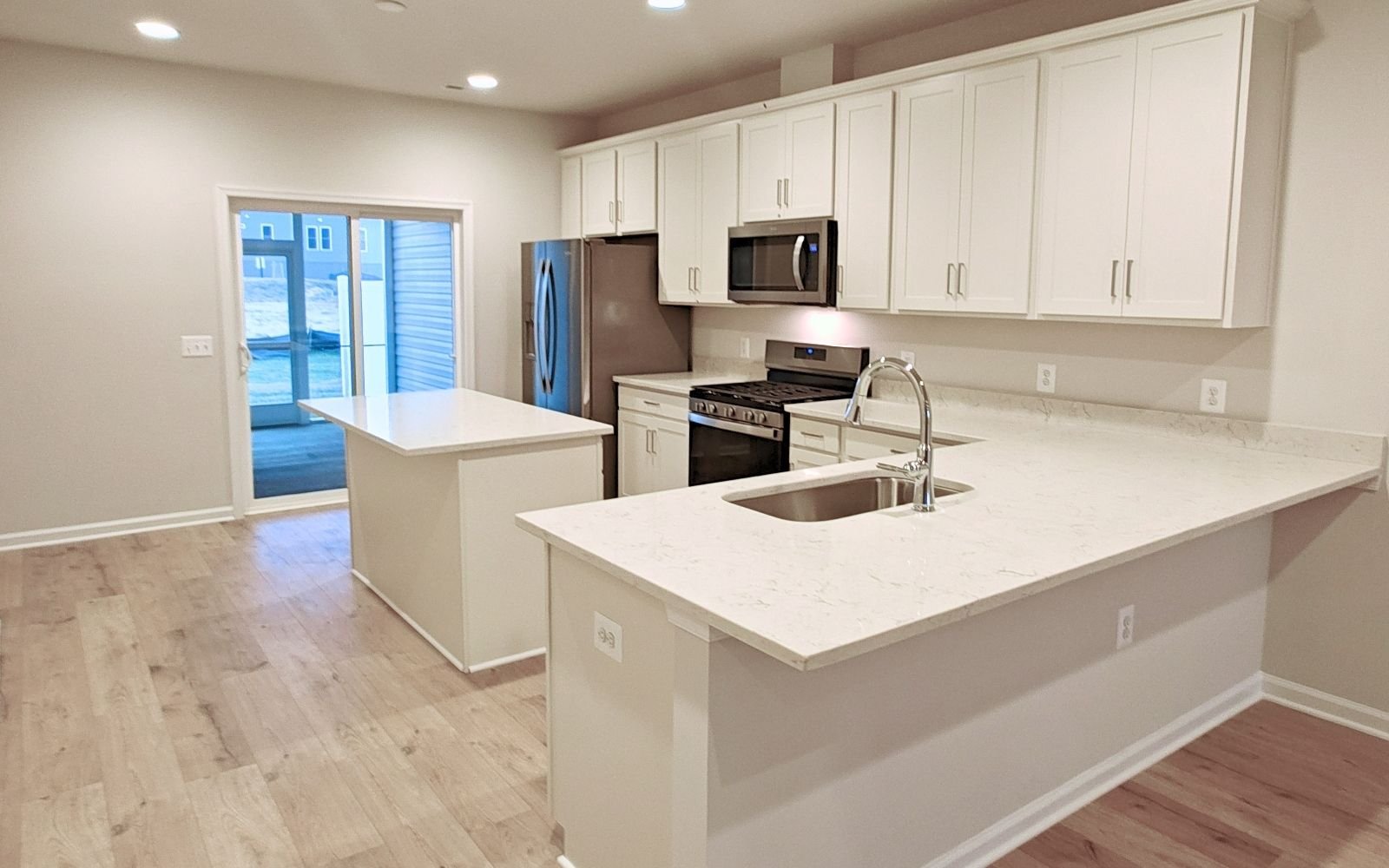 The kitchen of the Northgate on homesite 1010 at Hiatt Pointe at Snowden Bridge.