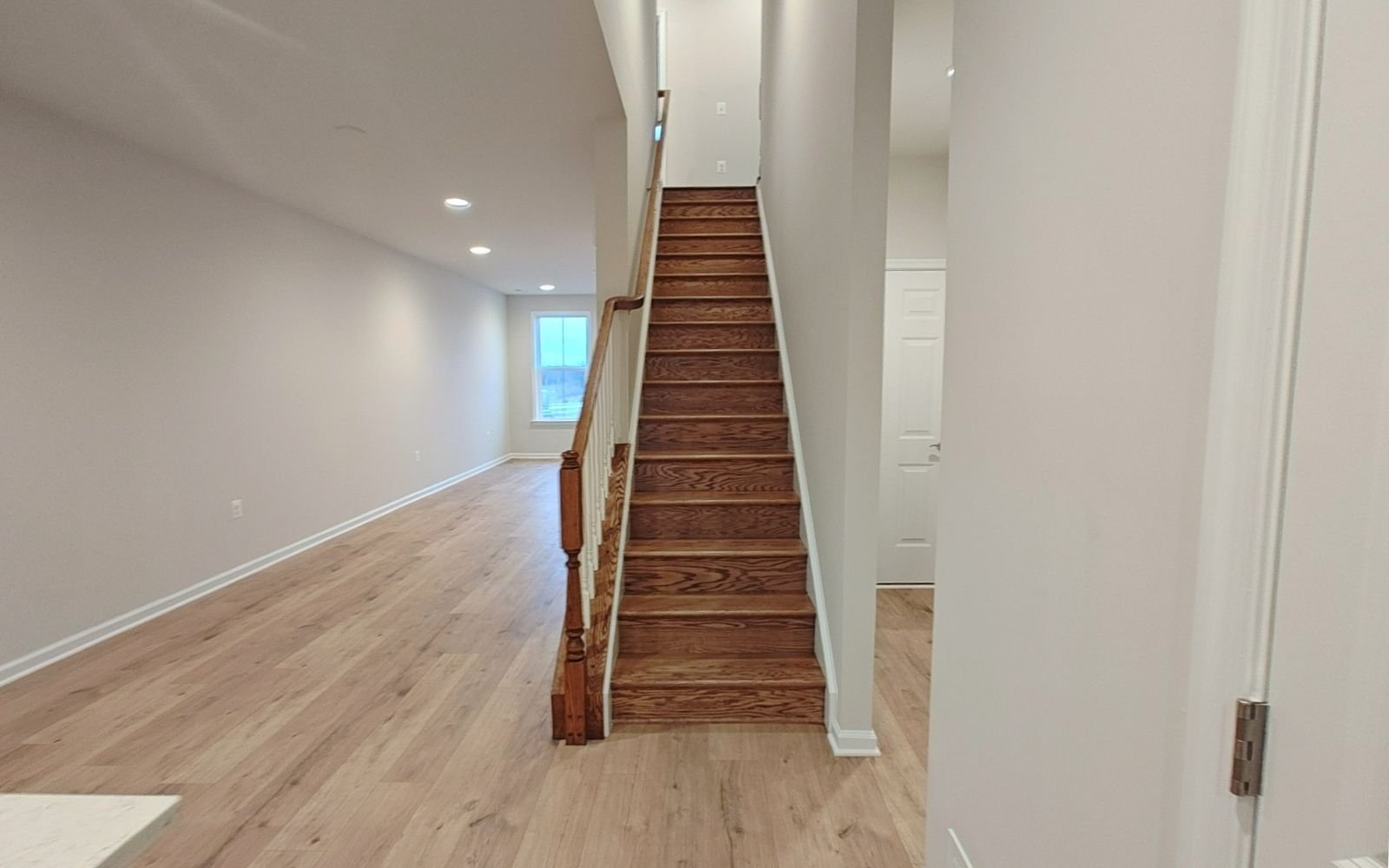 The stairs of the Northgate on homesite 1010 at Hiatt Pointe at Snowden Bridge.