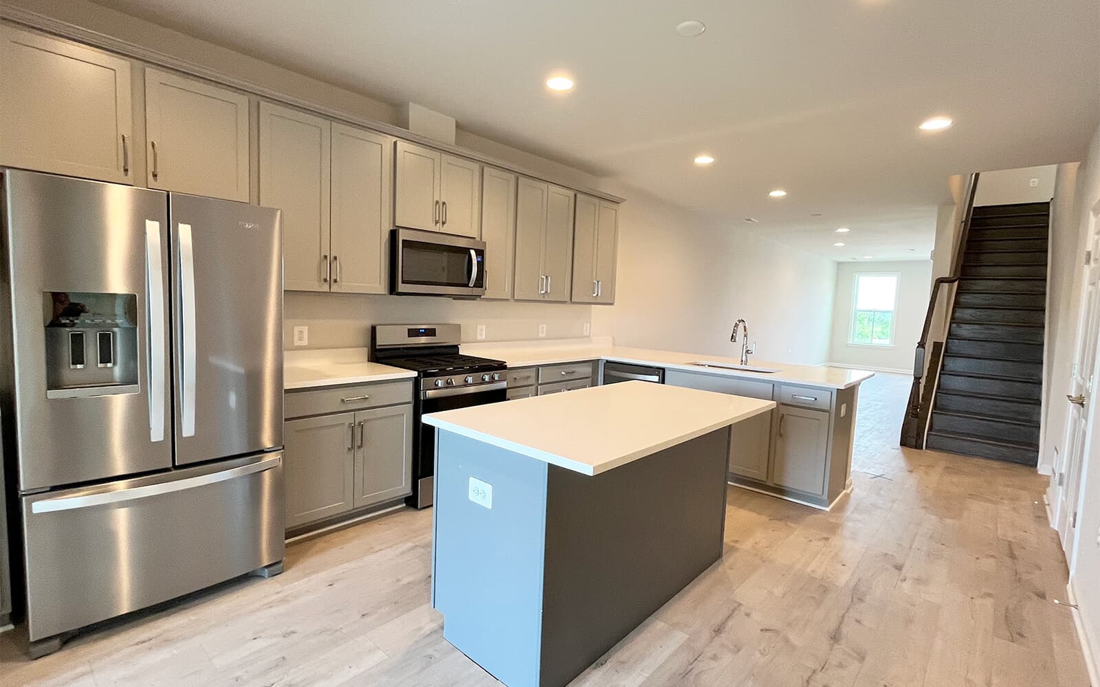 The kitchen in the Northgate on homesite 1012 at Hiatt Pointe at Snowden Bridge by Brookfield Residential.