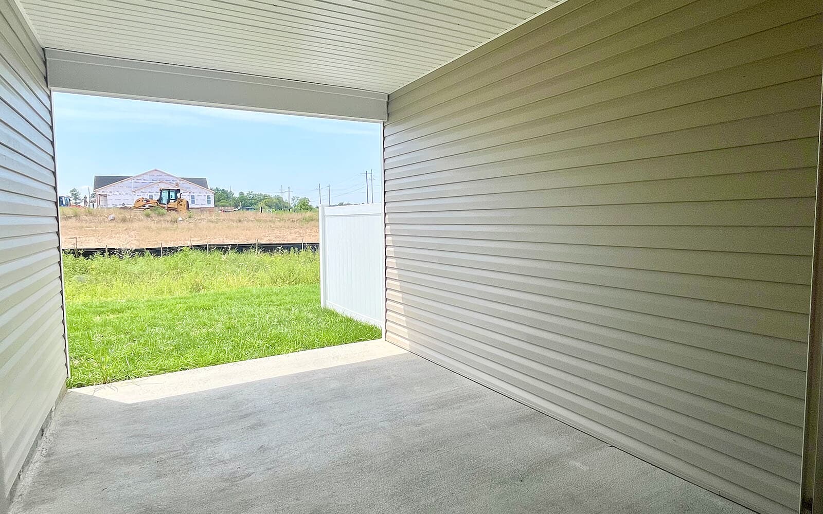 The screened porch in the Northgate on homesite 1012 at Hiatt Pointe at Snowden Bridge by Brookfield Residential.