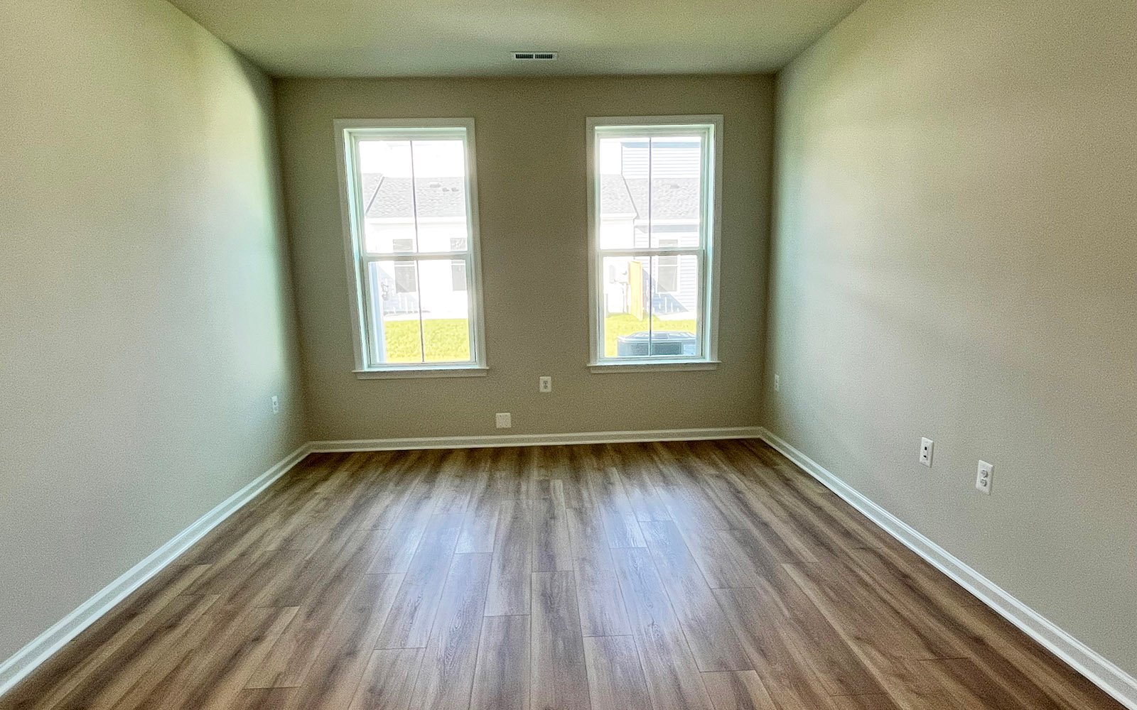 The main level primary bedroom of the Northgate on homesite 1099 at Hiatt Pointe at Snowden Bridge.