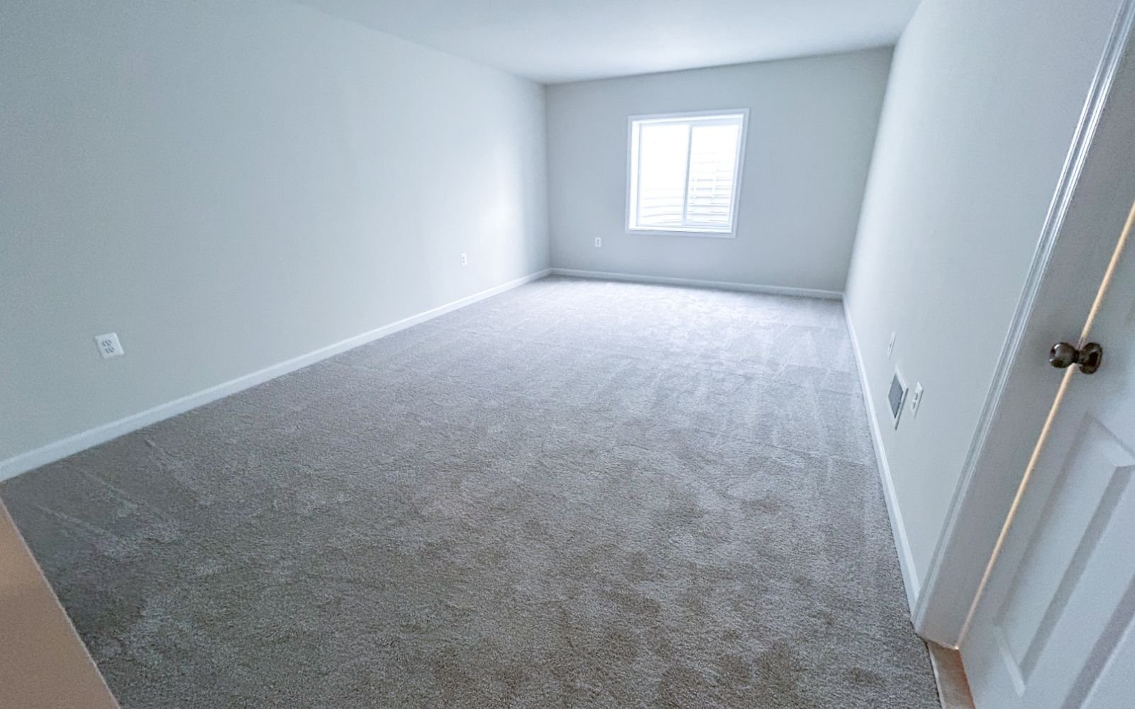 A secondary bedroom in the Matisse on homesite 1120 at Hiatt Pointe at Snowden Bridge.
