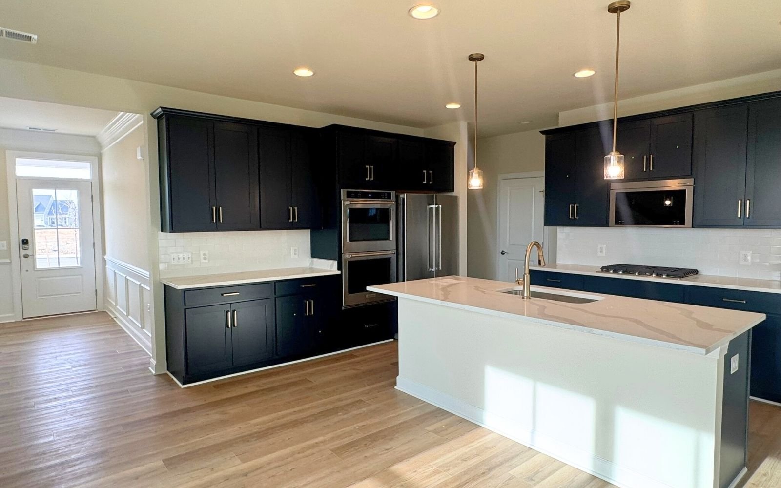The kitchen of the Hemingway on homesite 2110 at Hiatt Pointe at Snowden Bridge.