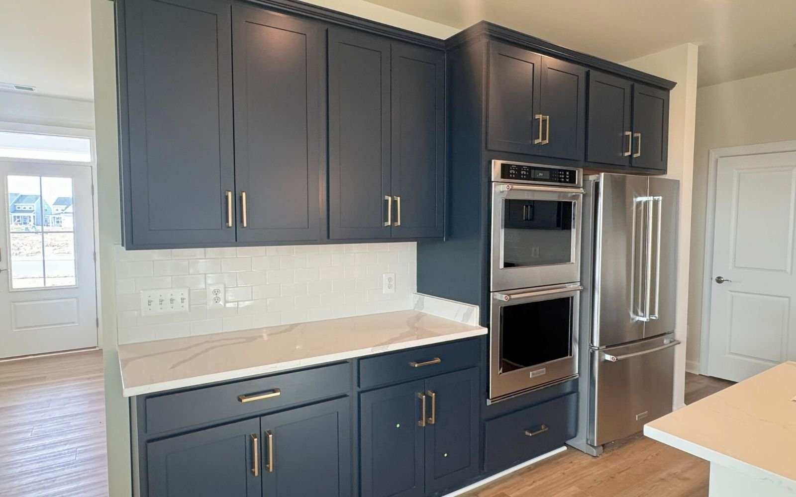 The kitchen of the Hemingway on homesite 2110 at Hiatt Pointe at Snowden Bridge.