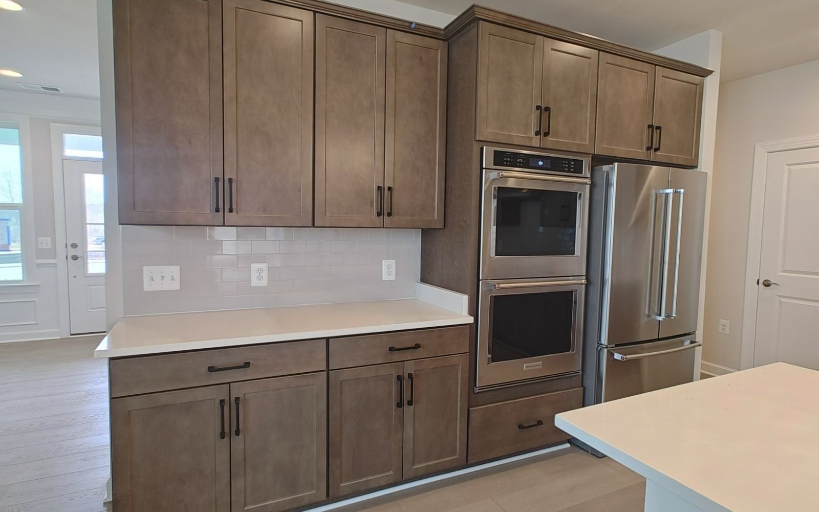 The kitchen of the Hemingway on homesite 2118 at Hiatt Pointe at Snowden Bridge.
