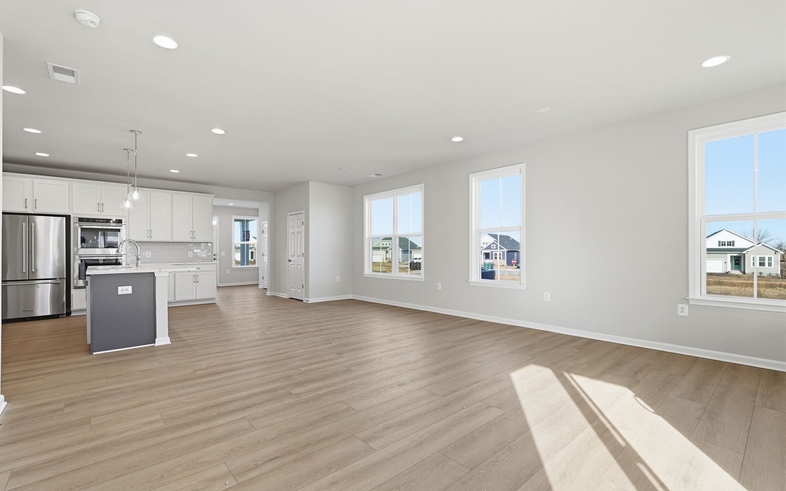 The family room of the Hemingway on homesite 2111 at Hiatt Pointe at Snowden Bridge.