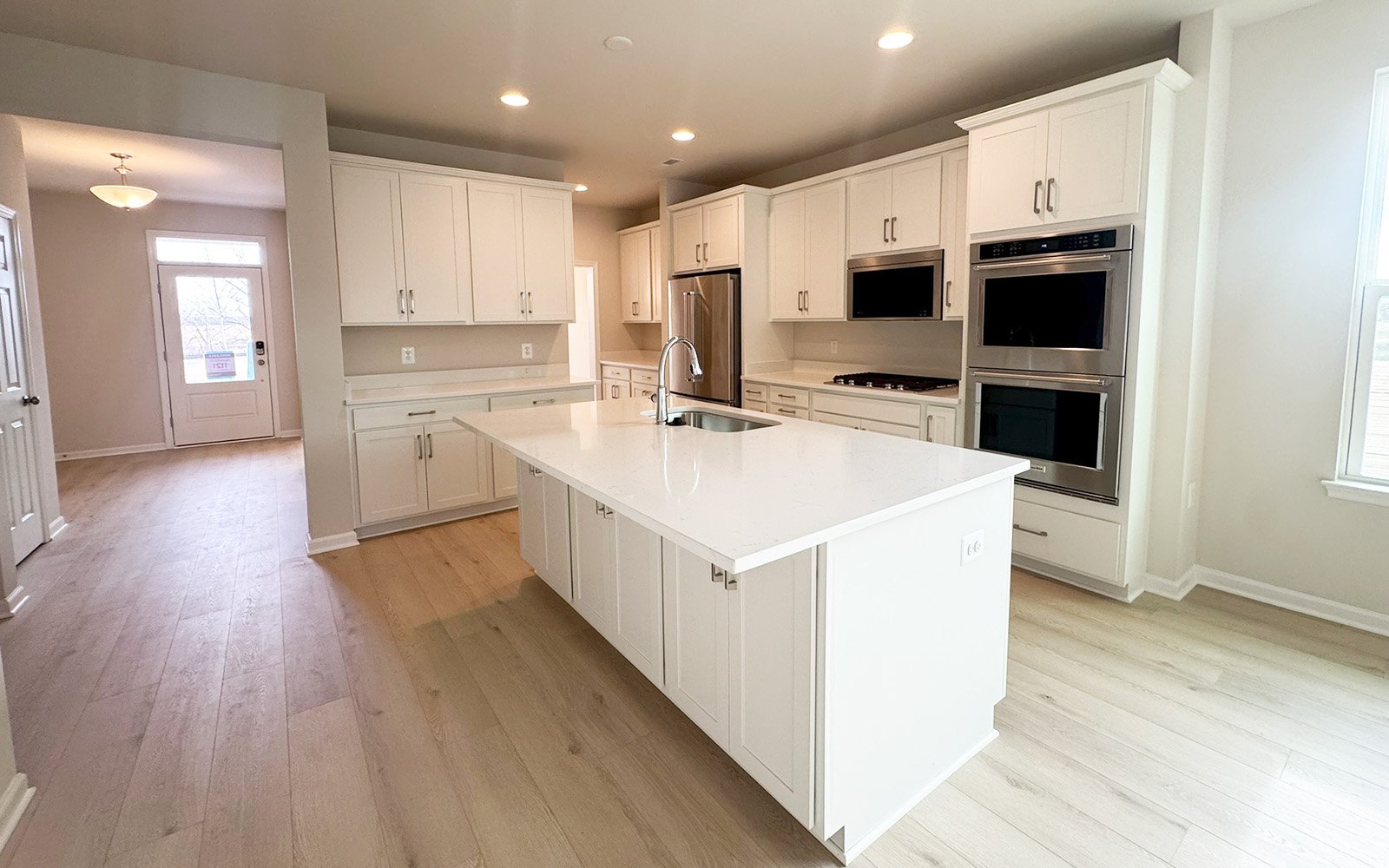 The kitchen of the Rockwell on homesite 1121 at Hiatt Pointe at Snowden Bridge.