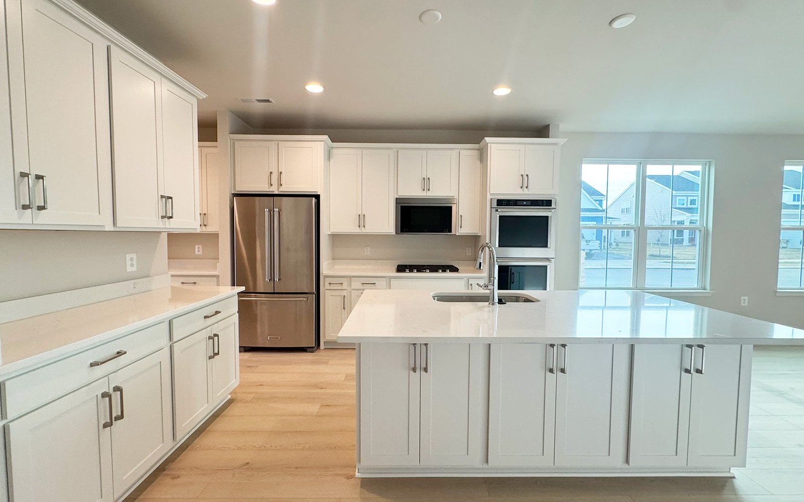 The kitchen of the Rockwell on homesite 1121 at Hiatt Pointe at Snowden Bridge.