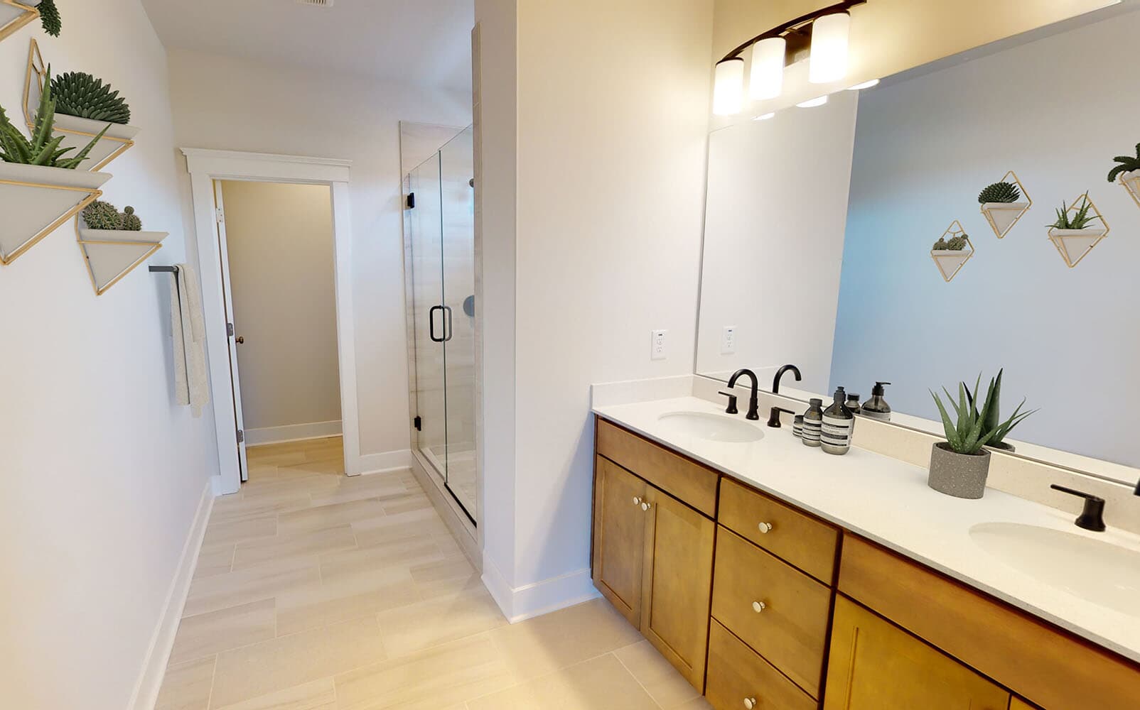 The primary bathroom of the Monroe by Brookfield Residential