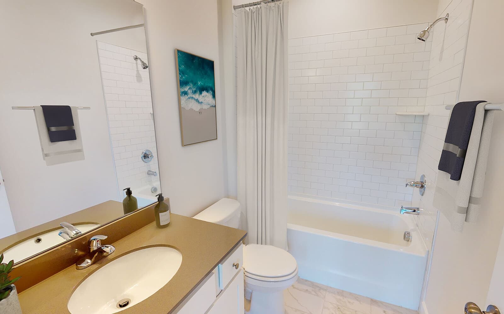 The secondary bathroom of the Monroe by Brookfield Residential