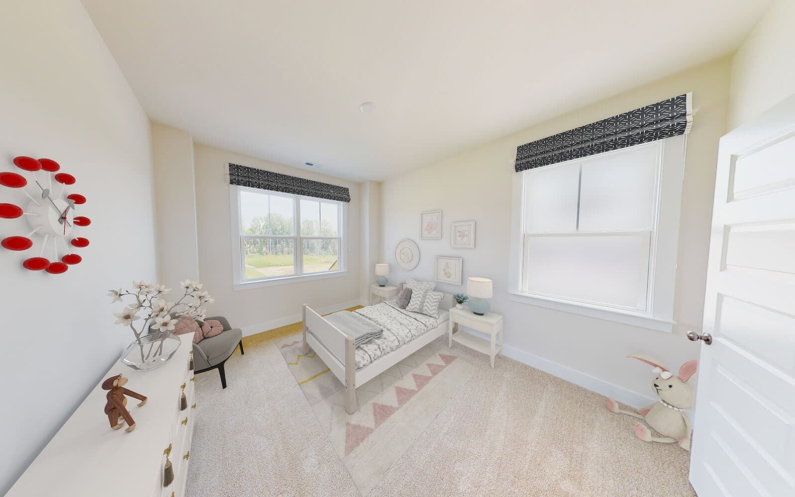 A secondary bedroom of the Sinclair by Brookfield Residential