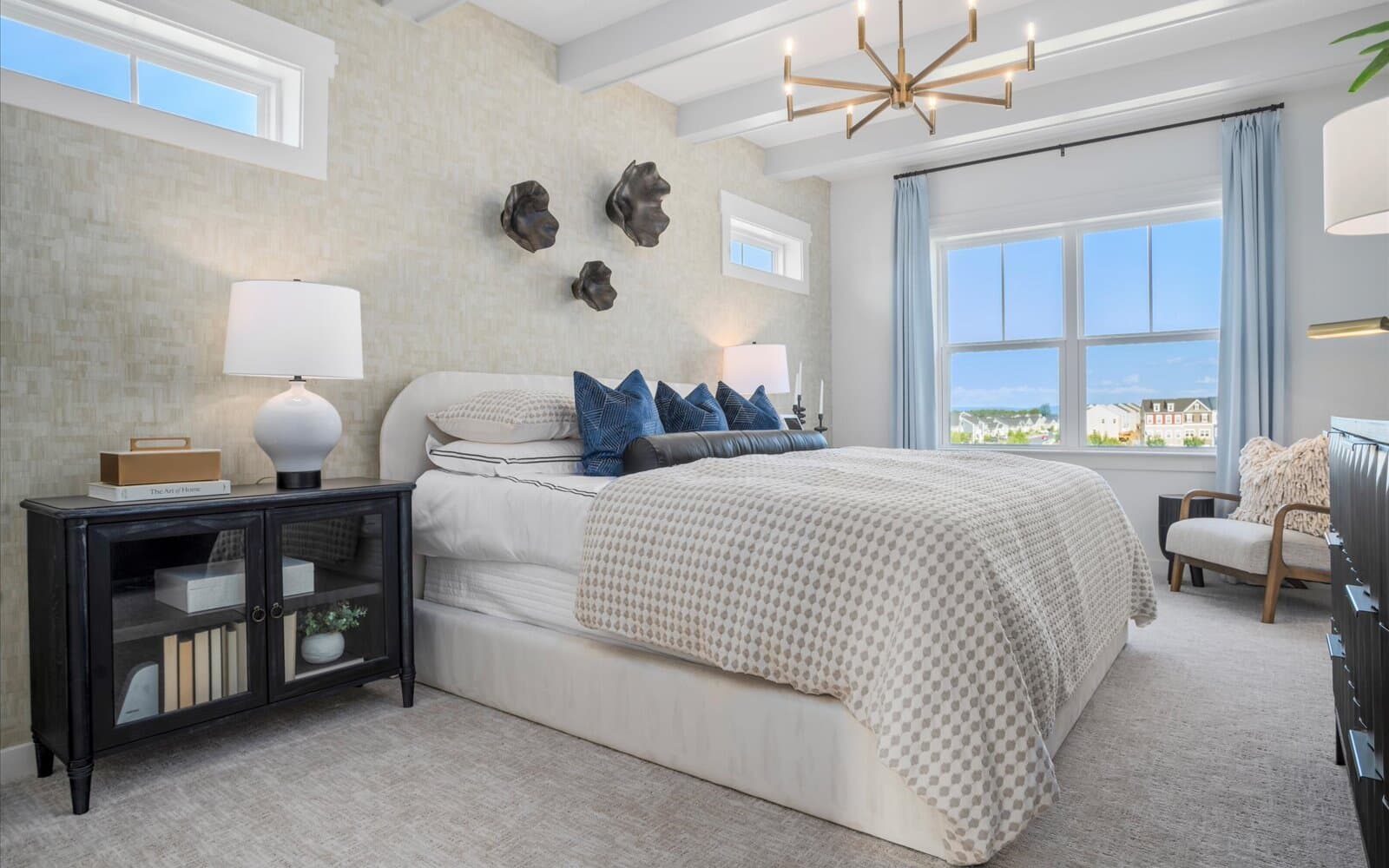The primary bedroom of the Skyline Townhome at Snowden Bridge. 
