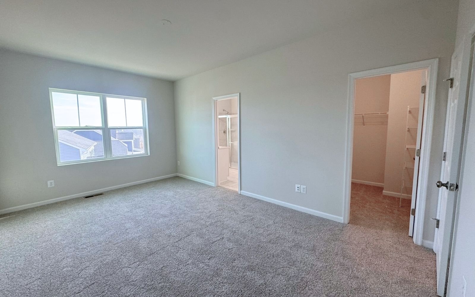 The primary bedroom of the Skyline on homesite 2151 at Snowden Bridge.