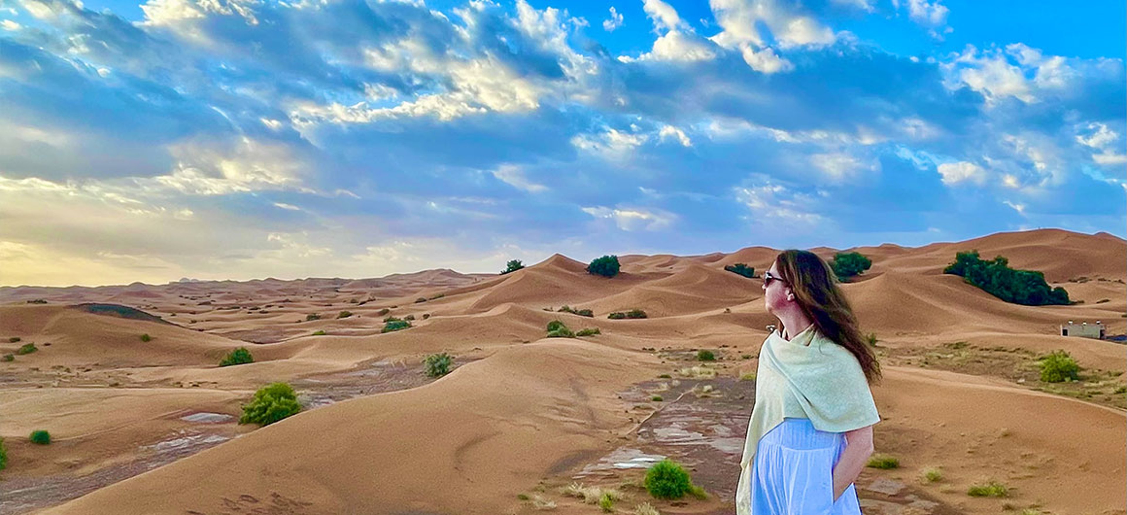 Erica Bray standing in the Sahara in Morocco