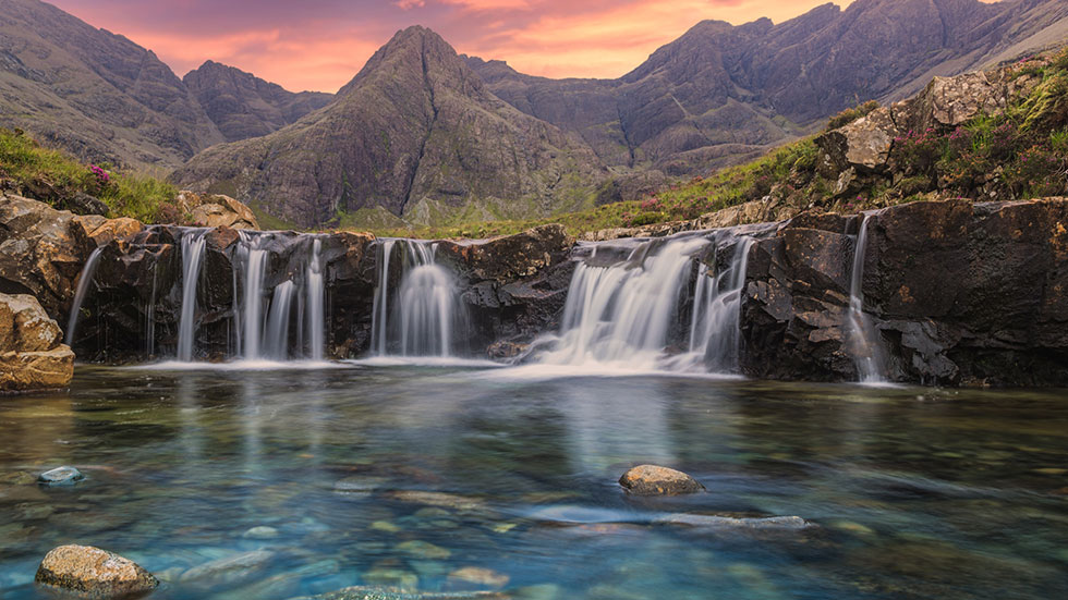 Amazing sunset at the Fairy Pools, Glen Brittle, Isle of Skye, Scotland. Photo courtesy of TomasSereda/iStock.com