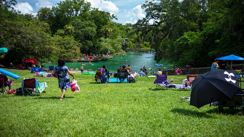 Woman in a see through kayak in Florida nature park
