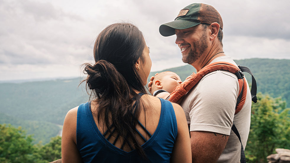 Erica and Loren enjoy the view from Coopers Rock with their seven-month-old son