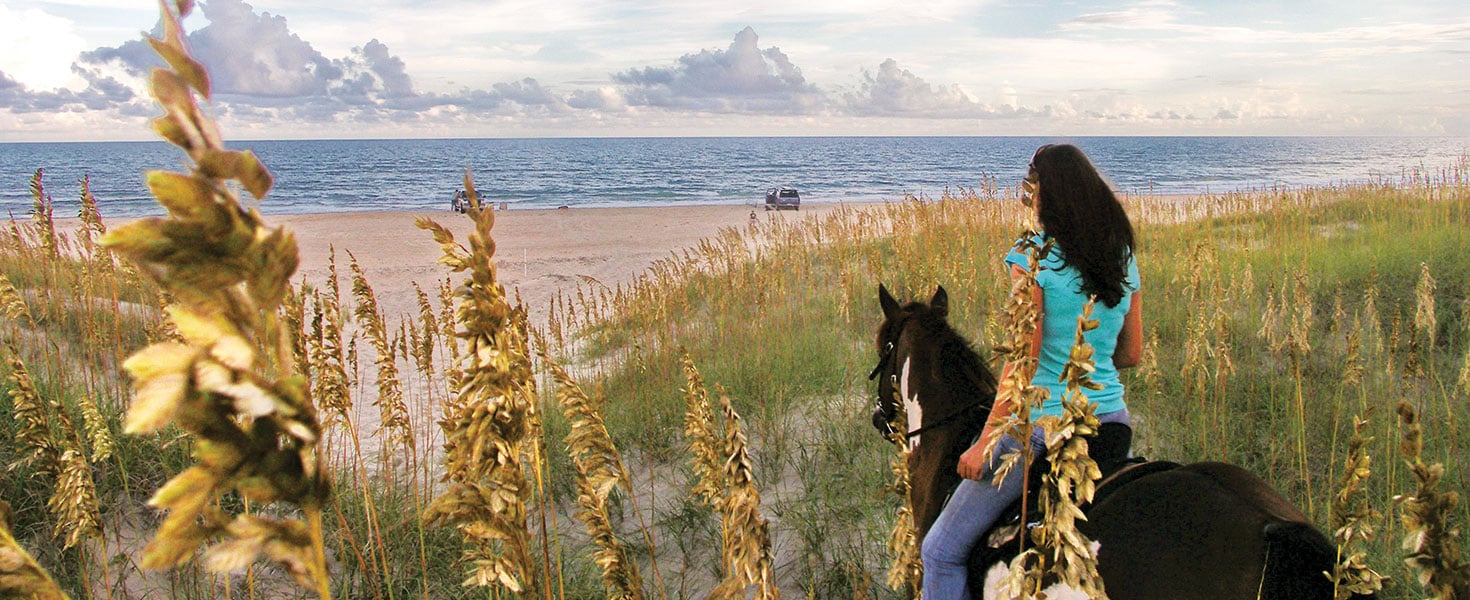 Woman on horseback in the Outer Banks