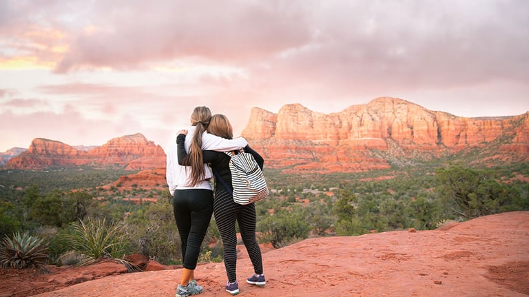 Lifelong friends love hiking outdoors. When they are together, the laughter, fresh air and strong connection with each other is all they need. Credit: AMR Image