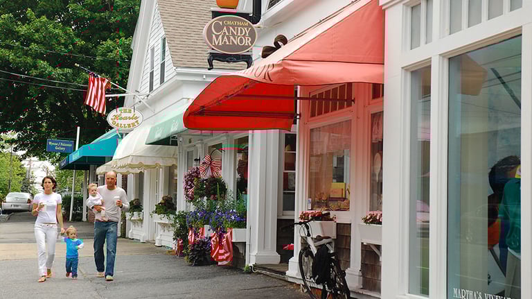 A family of four spend some quality time together on their summer vacation in Chatham, Massachusetts, on Cape Cod; photo by Kirkikis/iStock.com