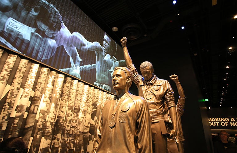 A statue representing the protest by U.S. black athletes at the Mexico City Olympic Games is on display at National Museum of African American History and Culture