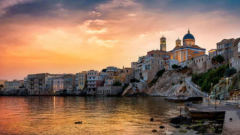 The cityscape of Ermoupolis town during sunset; Credit: SHansche