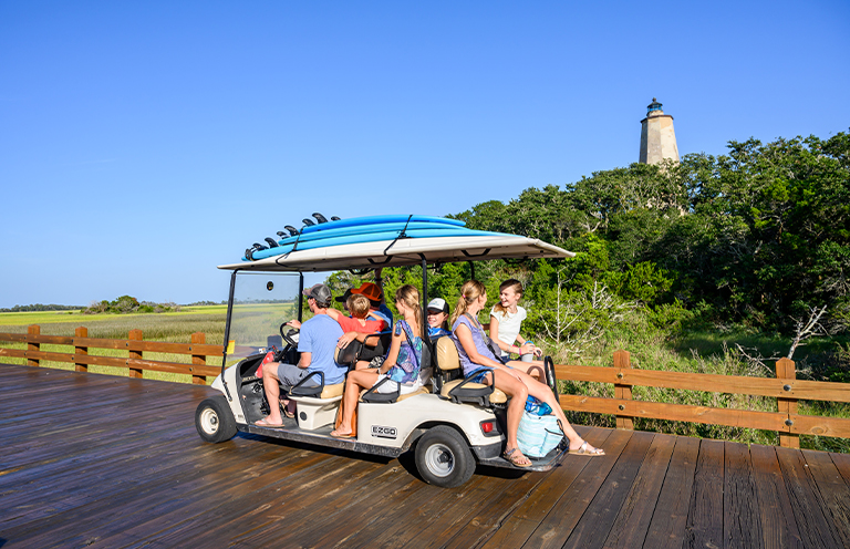 Girl riding bike on Bald Head Island