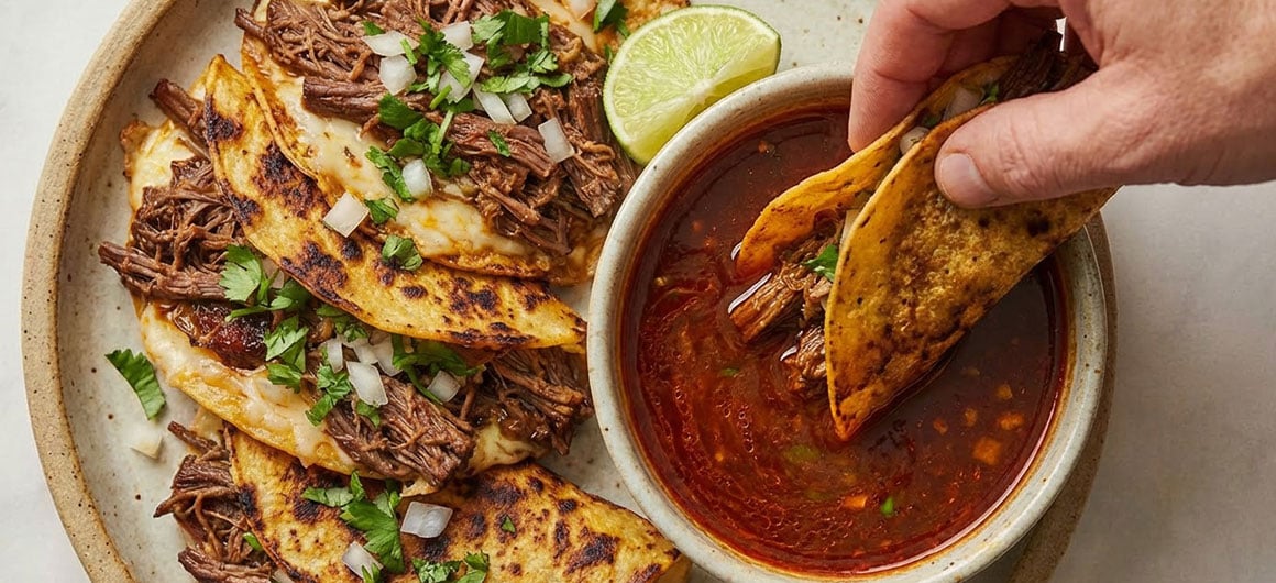 Delicious plate of birria tacos