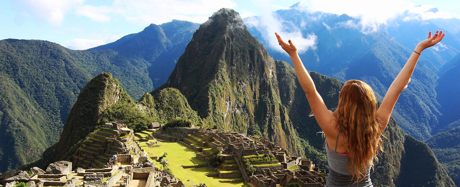 Woman in front of Machu Picchu