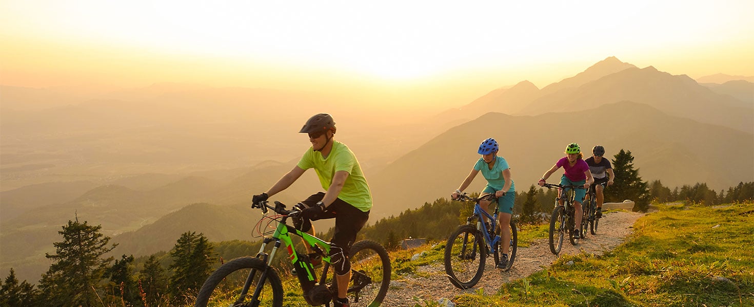 Group of electric bikers on mountain trail