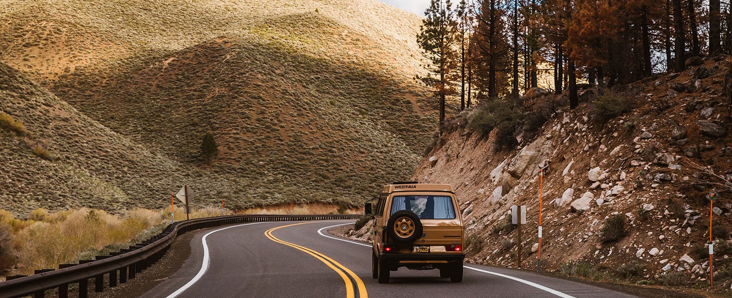 Car driving down a winding road