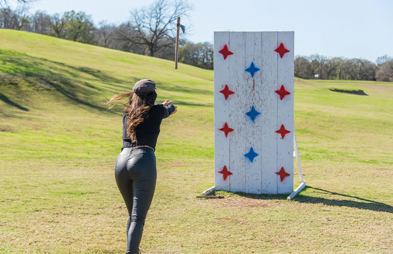 axe throwing at Hyatt Regency Lost Pines Resort & Spa