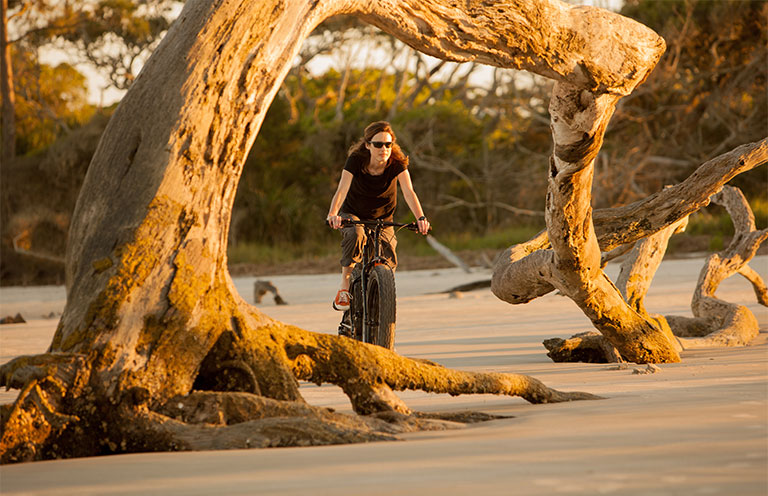 Woman riding bike on Jekyll Island