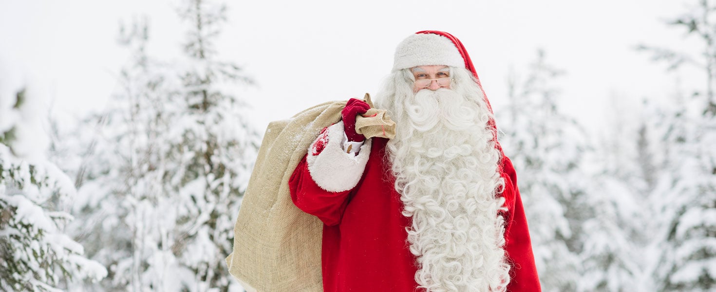 Santa holding gold bag, Finland