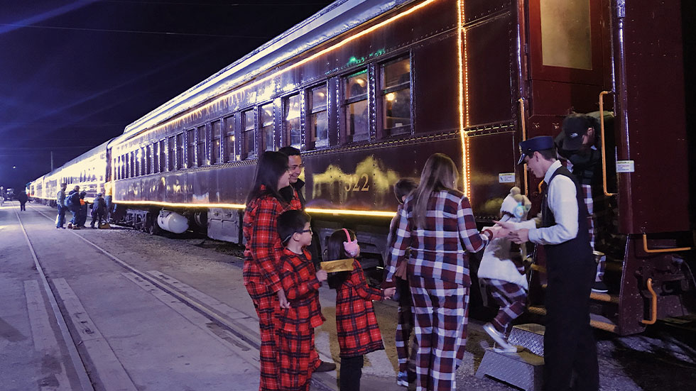 family boarding the Polar Express in Bryson City