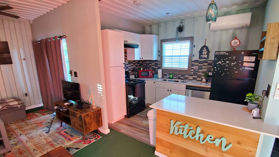 inside of a lodge made out of a shipping container