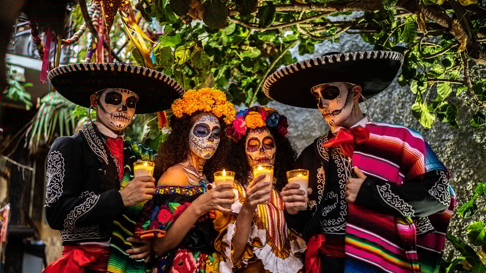 People dressed to celebrate Dia De Los Muertos 