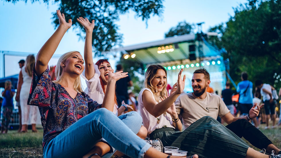 Group of friend outside at concert