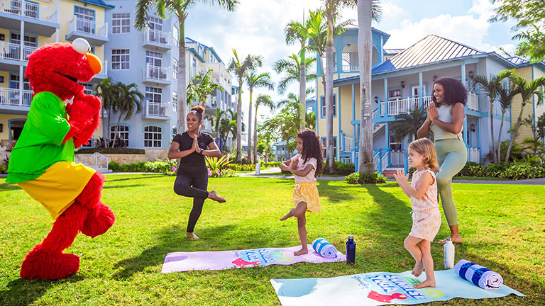 Family yoga with Elmo at Beaches Resorts; photo courtesy of Beaches Resorts