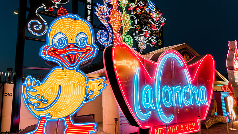 Colorful vintage neon signs displayed at the Neon Museum in Las Vegas.