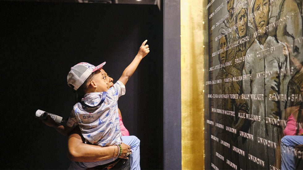 Memorial wall at Africatown Heritage House