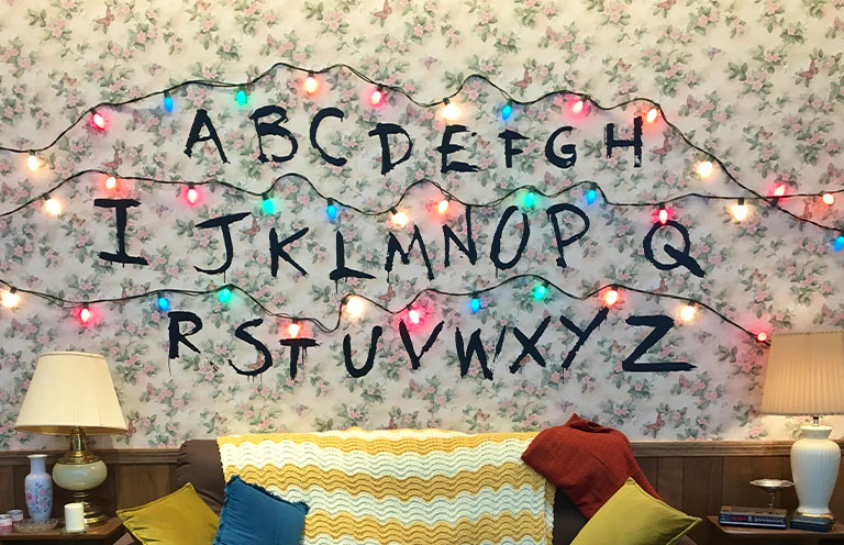 stranger things tv show living room wall decorated space