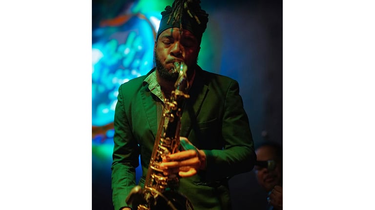 man playing saxaphone