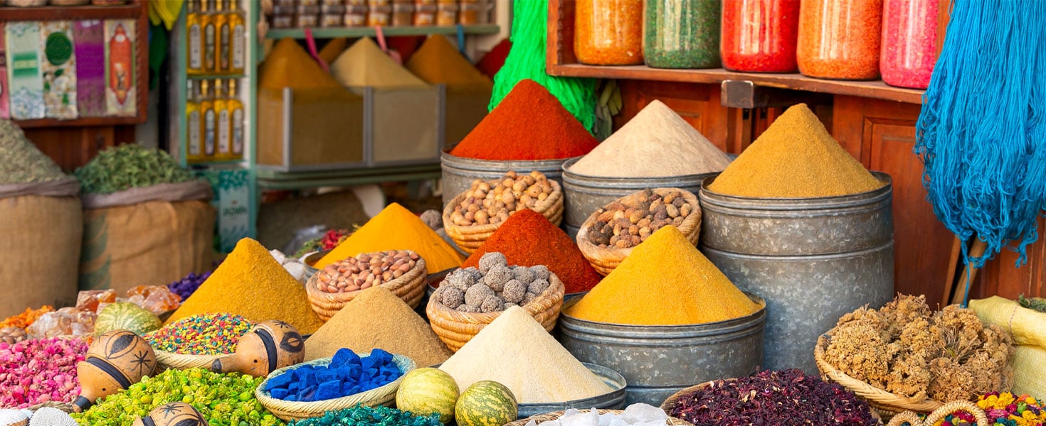 Colorful spices and dyes found at souk market in Marrakesh, Morocco