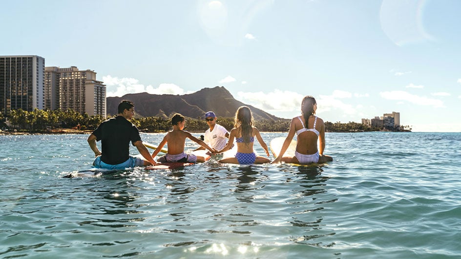 Family surf lesson on Waikiki Beach, Oahu